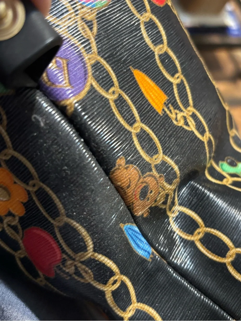 Dooney & Bourke Black Satchel with Multicolor Chain Charm Print